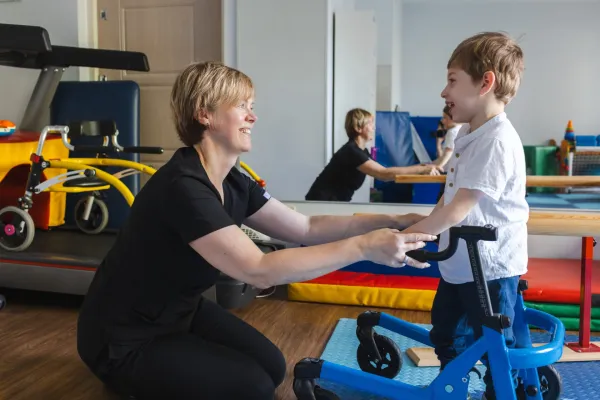 cute-little-boy-with-movement-disorders-stands-usi-2026-03-09-02-57-20-utc-69b7db0c95be0