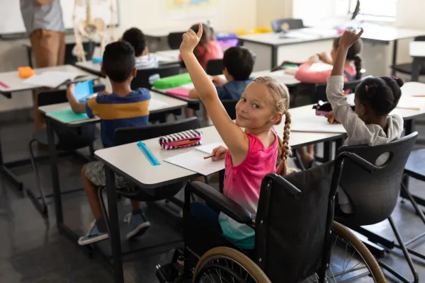 smiling-disable-schoolgirl-looking-at-camera-and-r-2026-01-09-10-55-03-utc-69b7e72c2144a